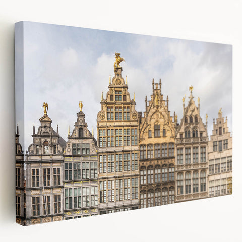 Side view of a stretched canvas depicting a serene European Belgian landscape, in soft earth tones.