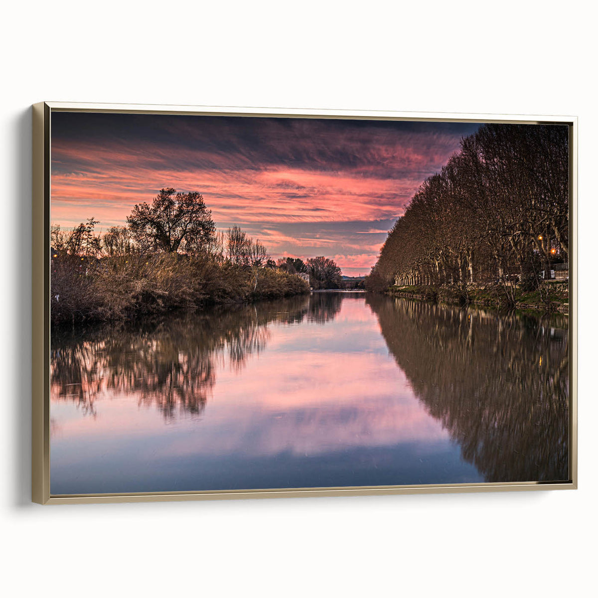 Framed canvas featuring a vintage-style landscape painting of southern France, with muted earth tones.