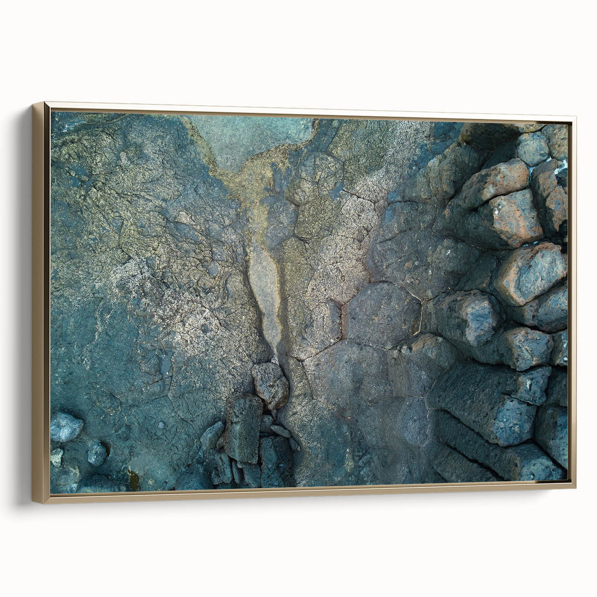 Framed canvas depicting a vintage-style landscape painting of the Canary Islands in muted gold and black tones.