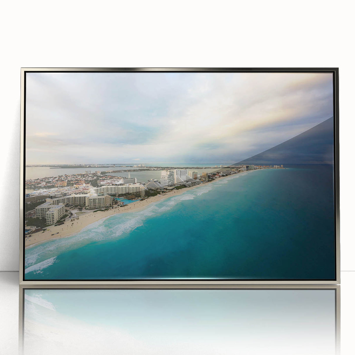 Mid-century modernist art depicting a serene Quintana Roo scenery in cool blue and green shades, silver-framed acrylic.