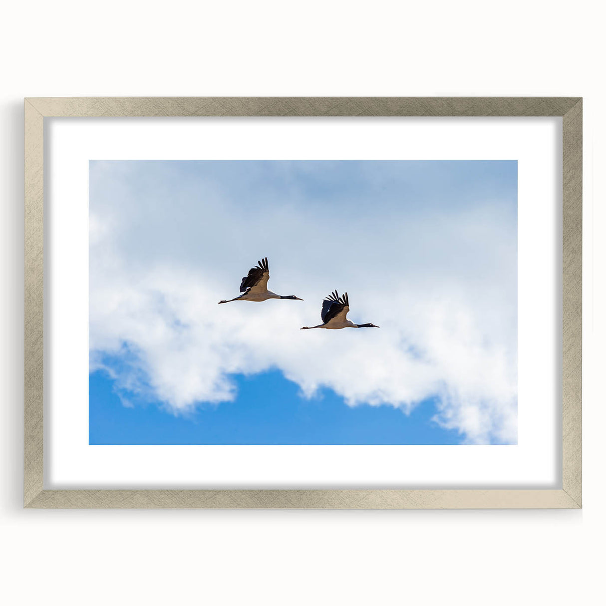 Textured abstract art print depicting Bhutan scenery in silver frame, ideal for bedroom art.