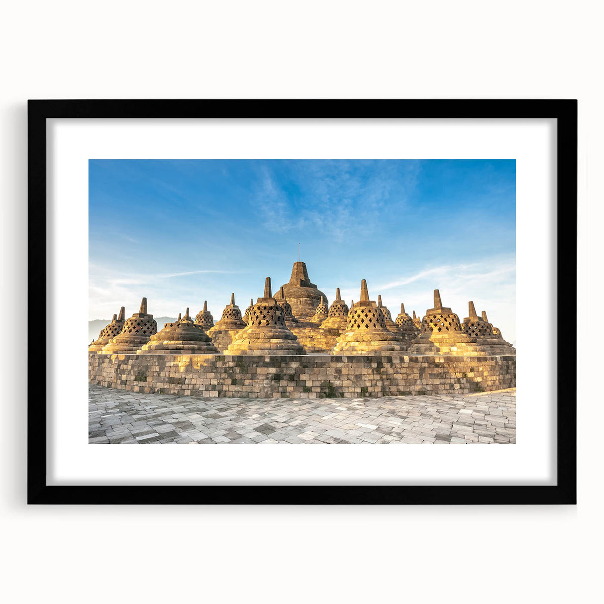 Extra large abstract art print featuring vibrant, colorful textures of Indonesian scenery, framed in black.