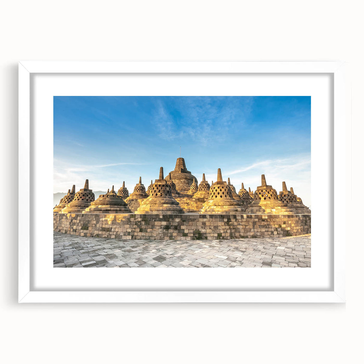 Abstract art print of an Asian landscape in muted green and blue tones, framed with a white mat.