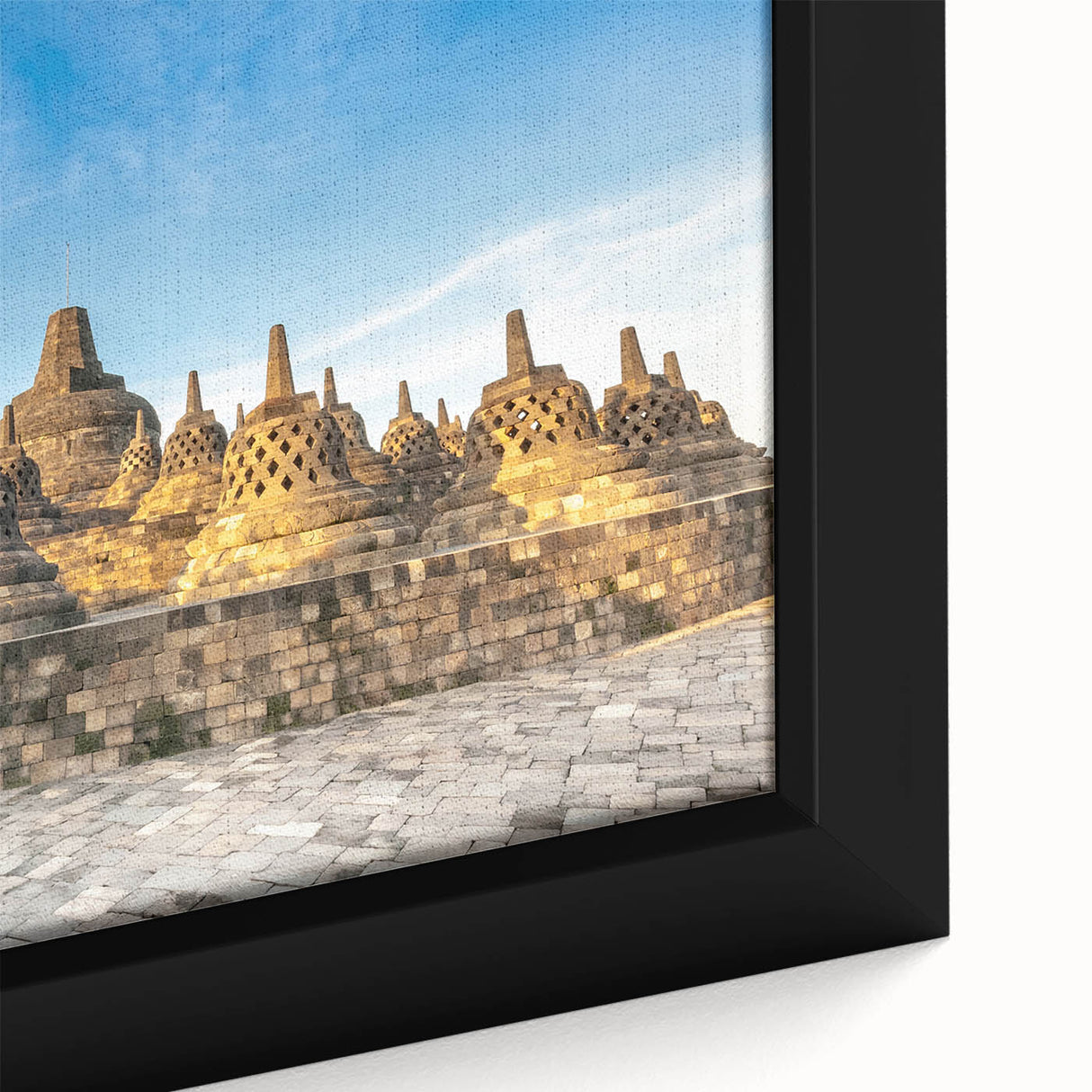 Extra large framed canvas featuring a textured depiction of an Indonesian landscape in black with colorful art accents.