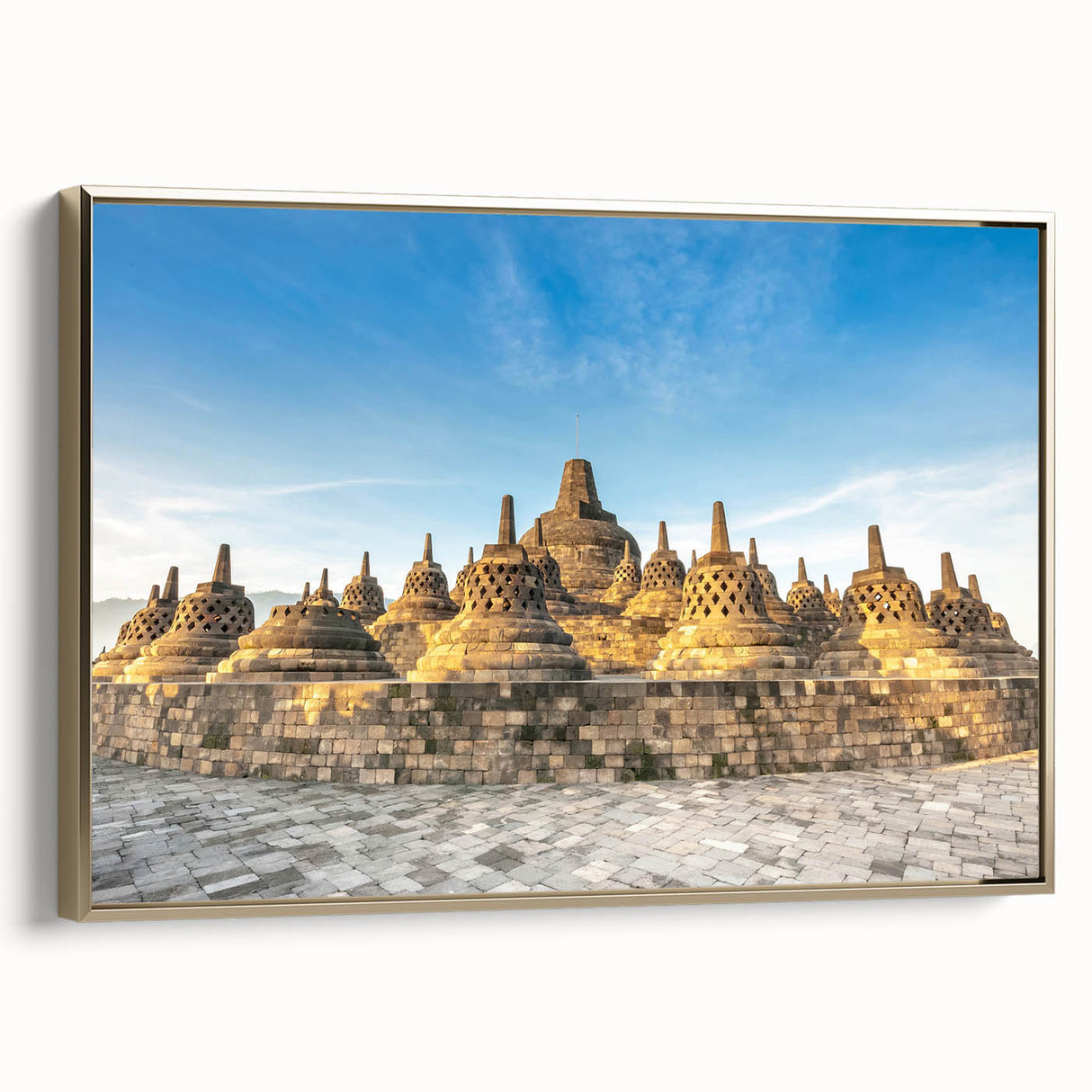 Framed canvas featuring a vintage-style Indonesian landscape in muted gold and black tones, ideal for bedroom wall decor.