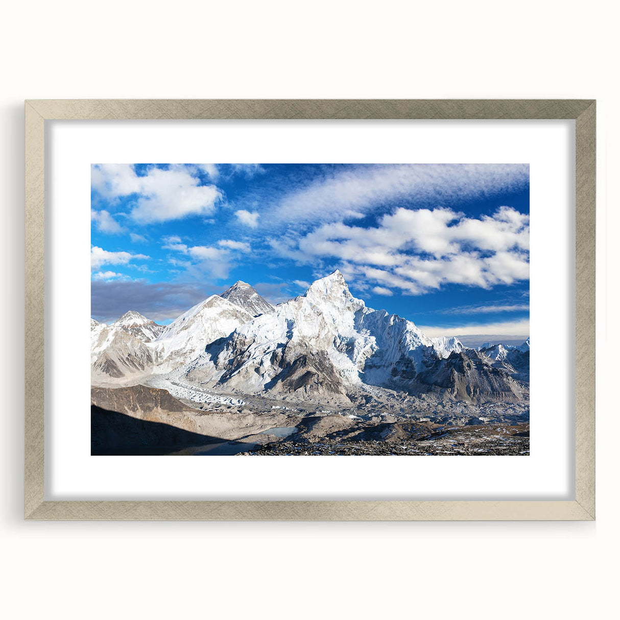 Textured art print featuring abstract depiction of Nepal scenery in earth tones, framed in silver, ideal for bedroom art.