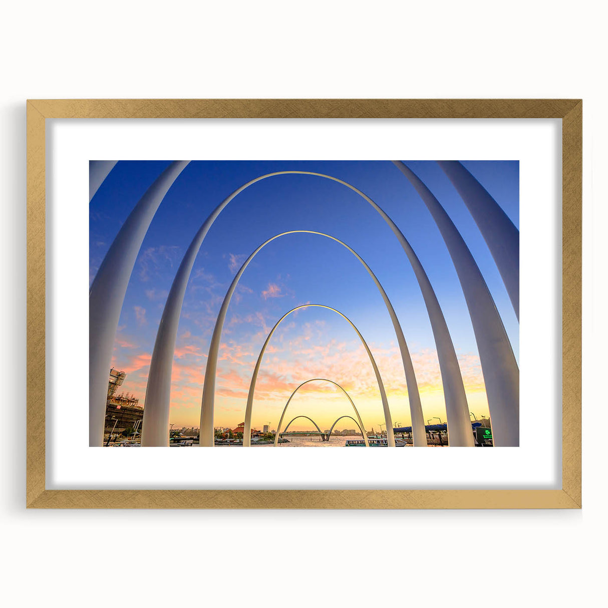 Textured abstract art print depicting the Perth skyline in muted gold and blue tones on a framed canvas.