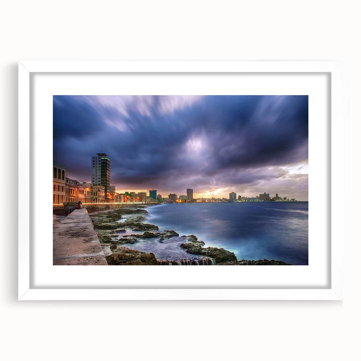 Textured art print depicting an abstract Caribbean scenery in vibrant blue and green tones, framed with a white mat.