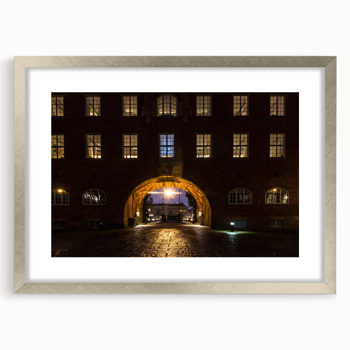 Textured abstract art print depicting a serene Stockholm scenery in muted blues and grays, framed in silver.