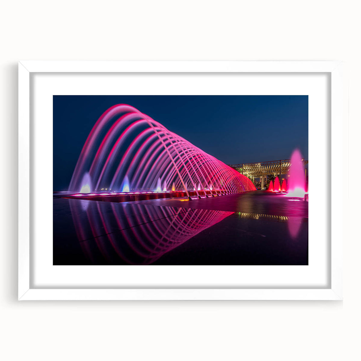 Abstract art print of a Qatar scenery in muted earth tones, framed with a white mat.