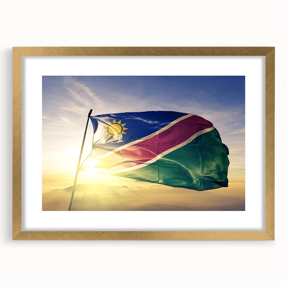 Abstract art print of an African landscape in gold frame, featuring earthy tones, ideal for dining room decor.