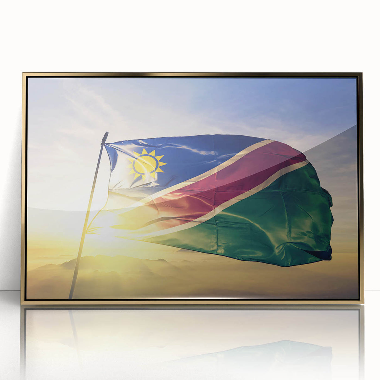 Acrylic print of a Namibian landscape in art deco style, featuring warm earth tones, framed in gold.