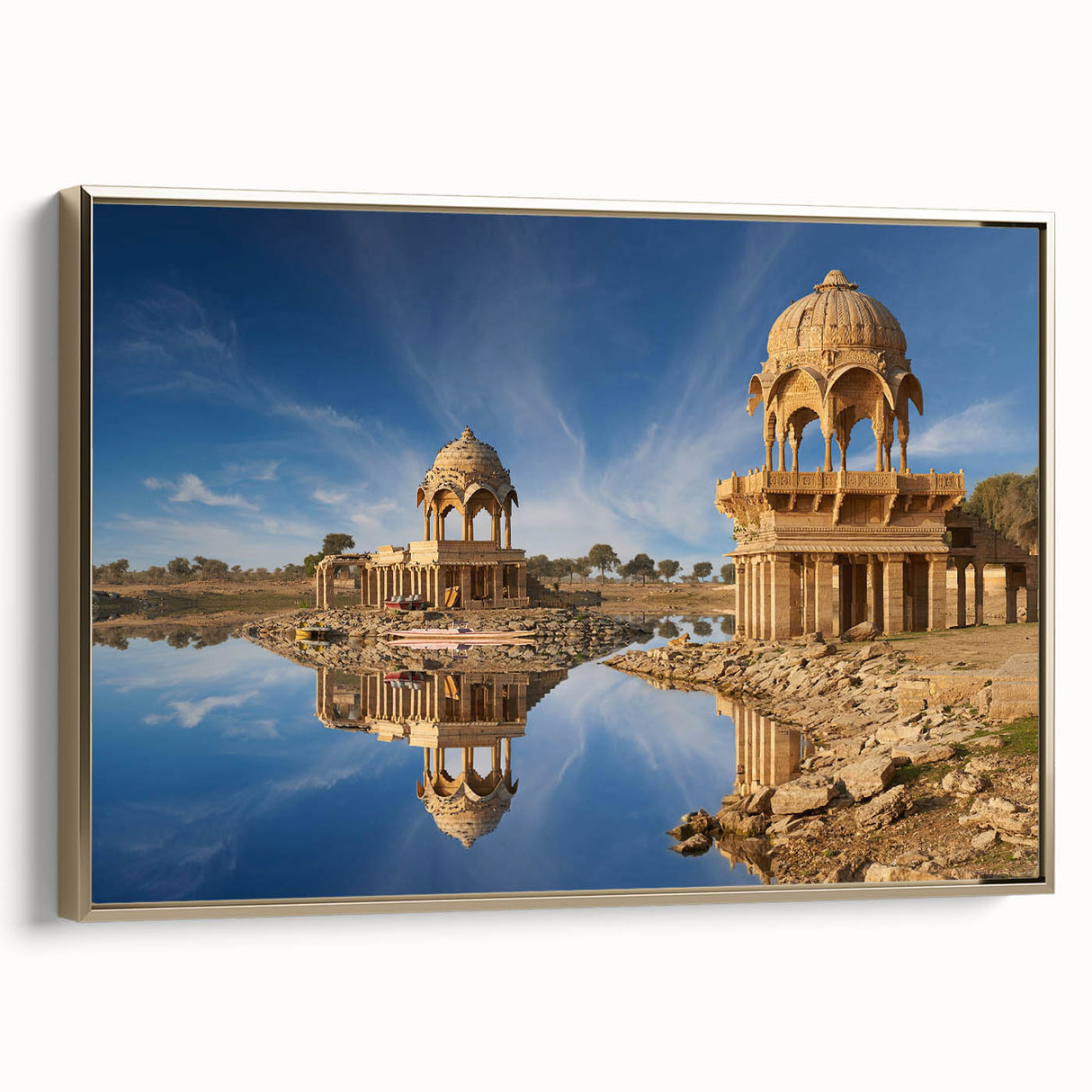Framed canvas depicting a vintage-style Indian landscape in muted gold and black tones, ideal for bedroom wall decor.