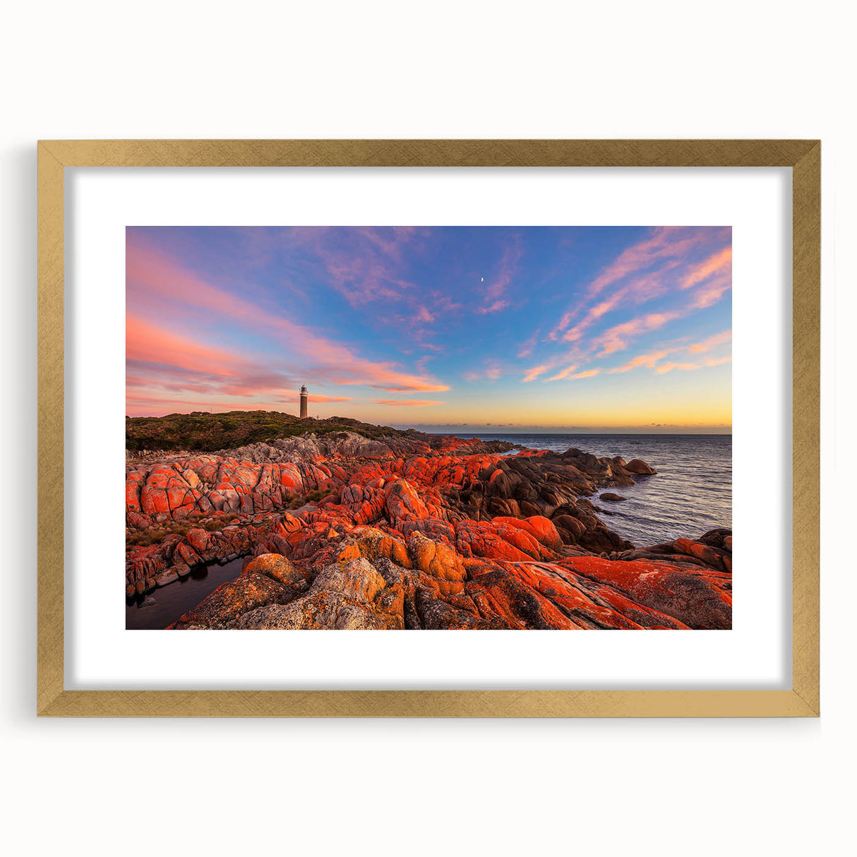 Abstract art print of Tasmania scenery in muted earth tones, framed in gold, suitable for dining room decor.