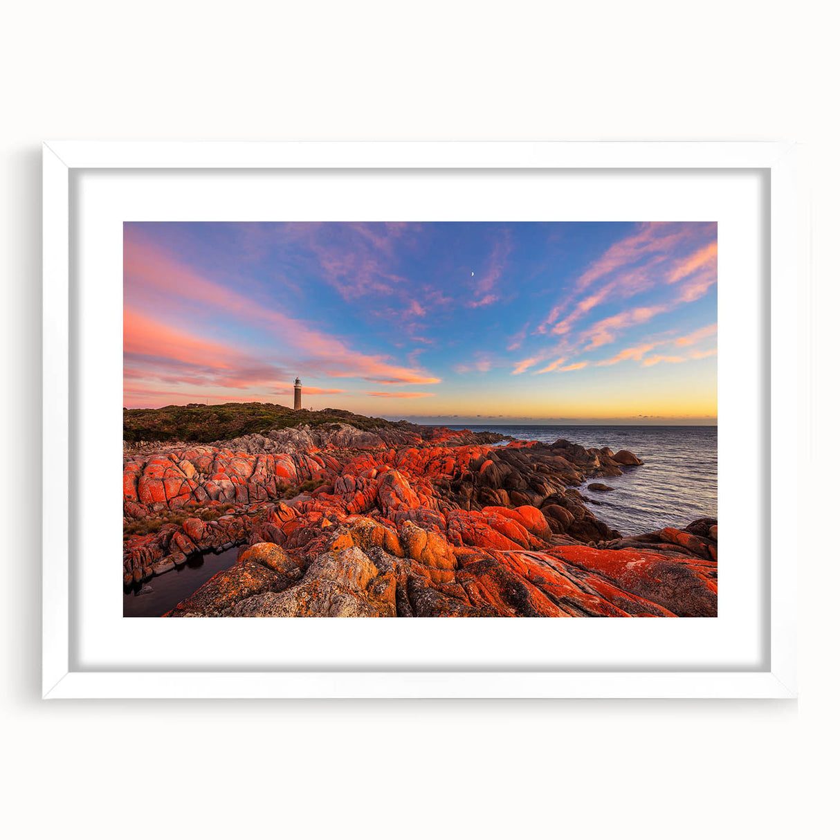 Textured art depicting an abstract Tasmanian landscape in muted earth tones, framed in white, suitable for bedroom decor.