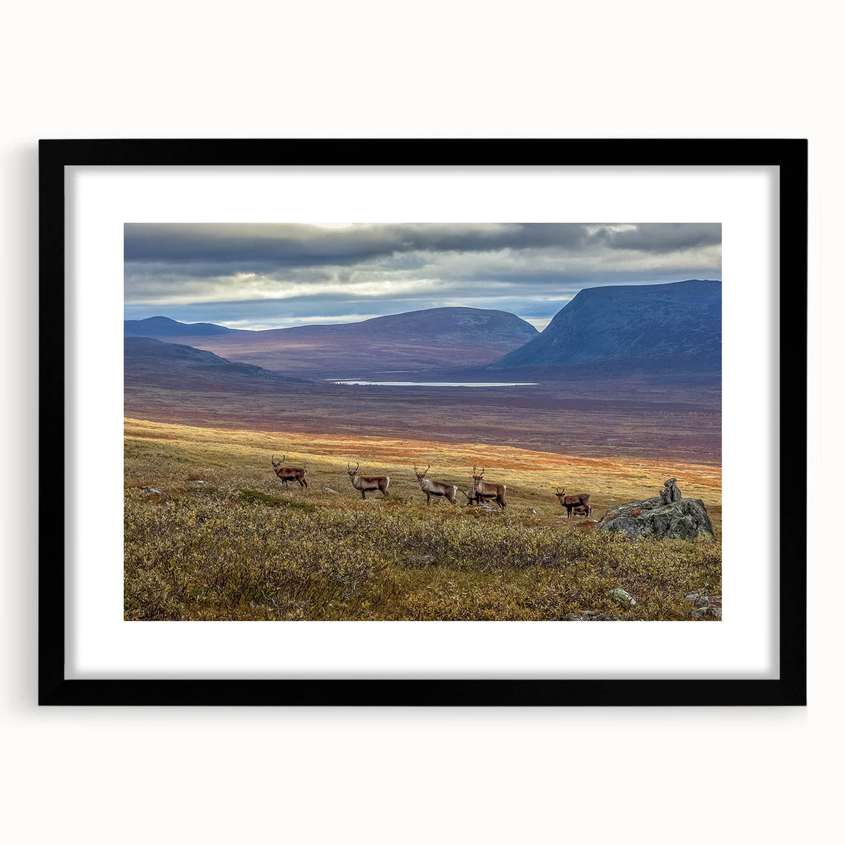 Extra large abstract art print of a textured European scenery in vibrant colors, framed in black.