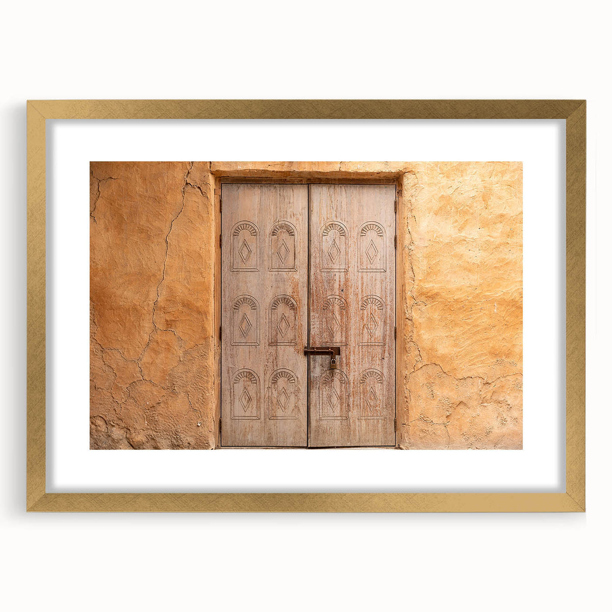 Extra large wall art featuring an abstract textured depiction of Dubai skyline in gold and black, framed with mat.