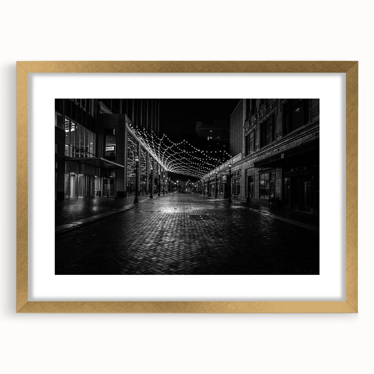 Abstract art print of Detroit skyline in textured gold frame, using muted earth tones.