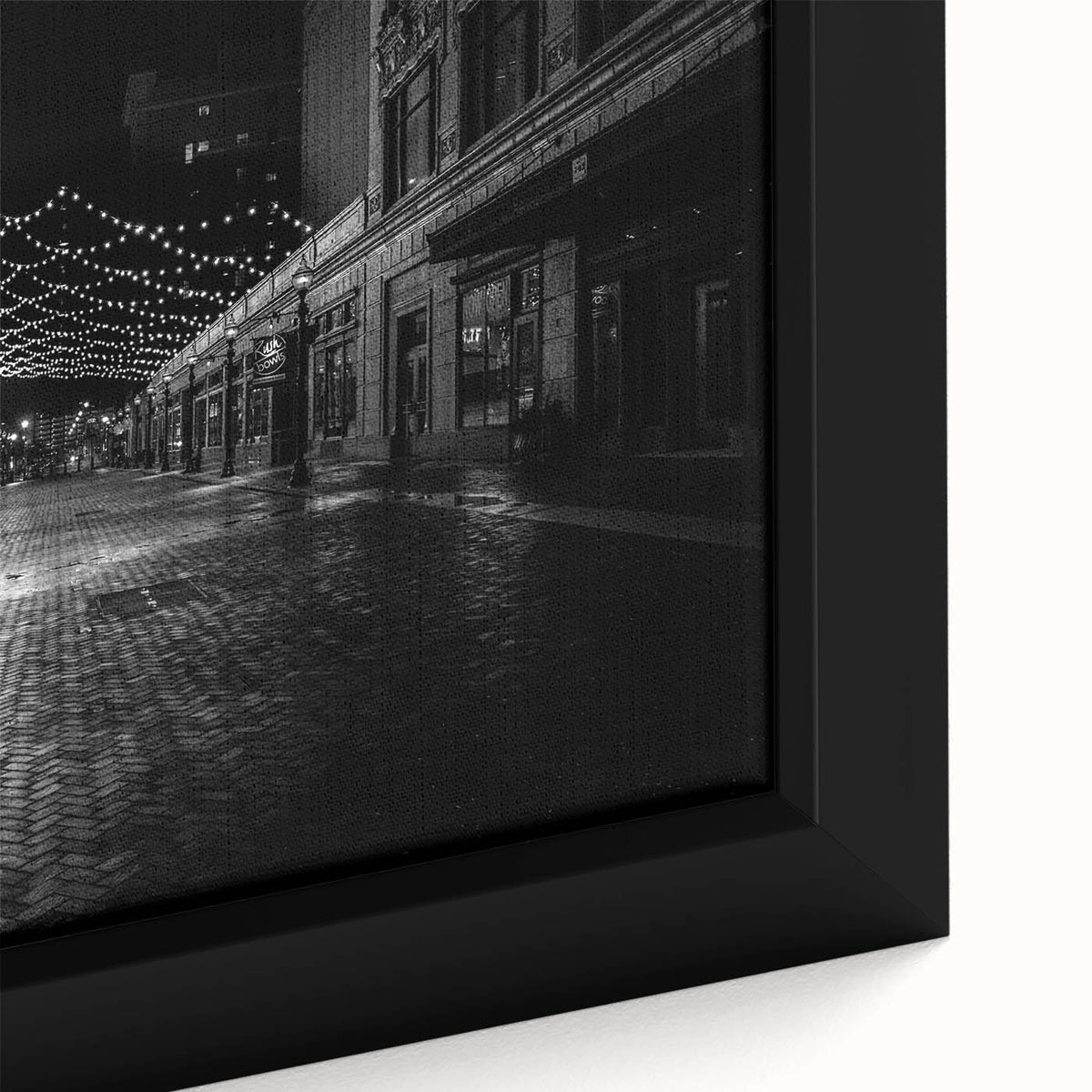 Extra large framed canvas featuring a textured depiction of Detroit’s skyline in black with colorful accents.