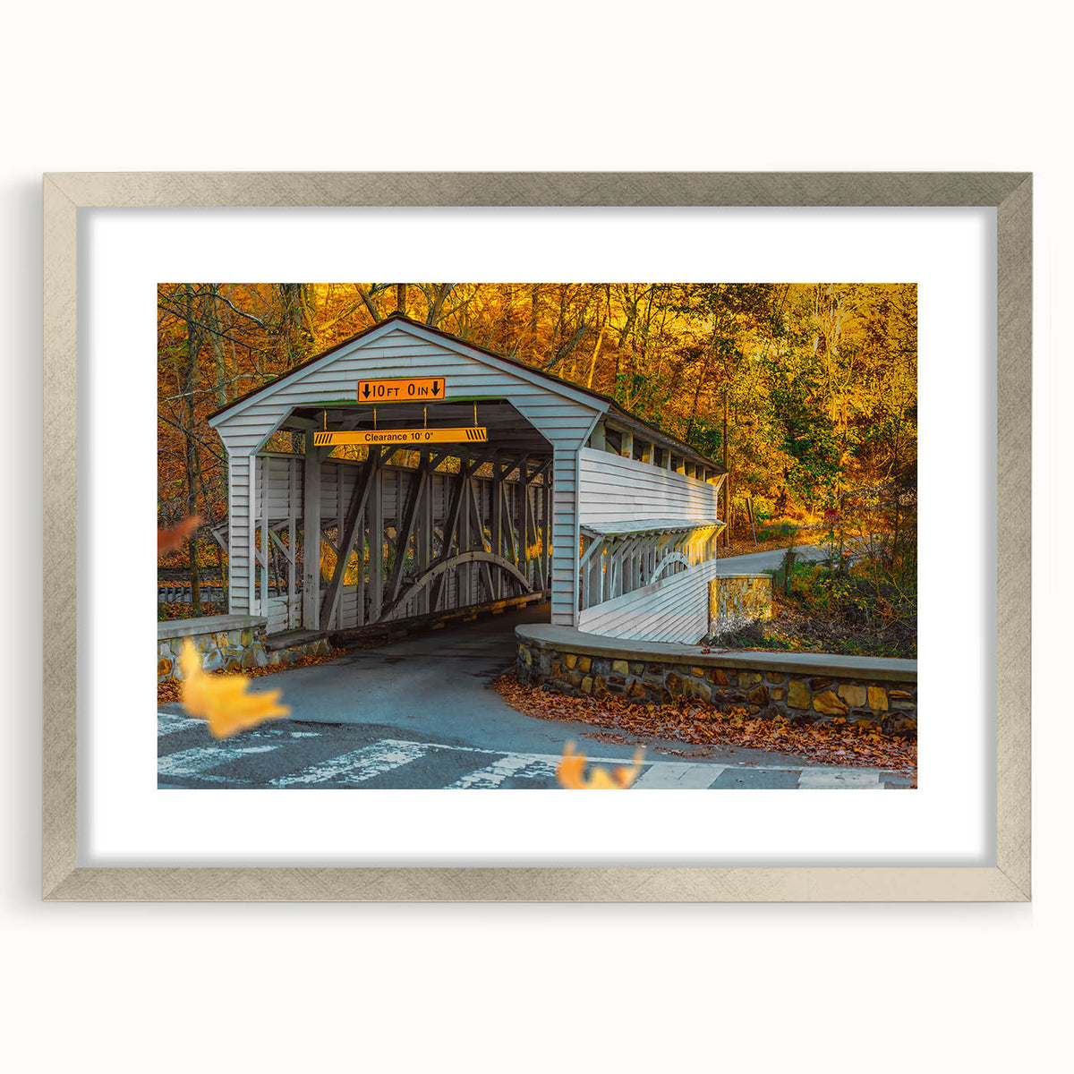 Textured abstract art print of Pennsylvania scenery in muted earth tones, framed in silver, suitable for bedroom decor.