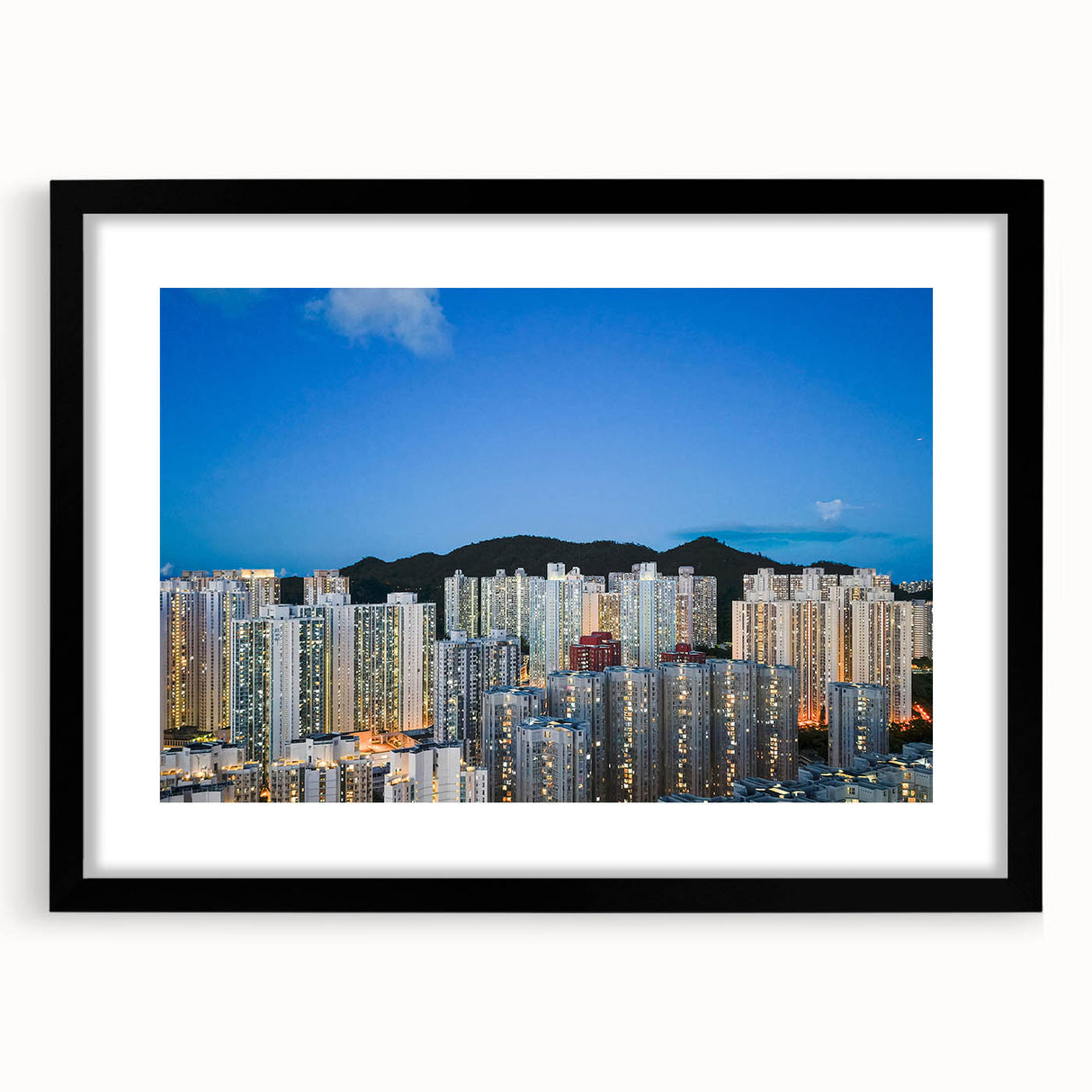 Colorful abstract art print of Hong Kong skyline in vibrant hues on a large framed canvas, well-suited for living room decor.