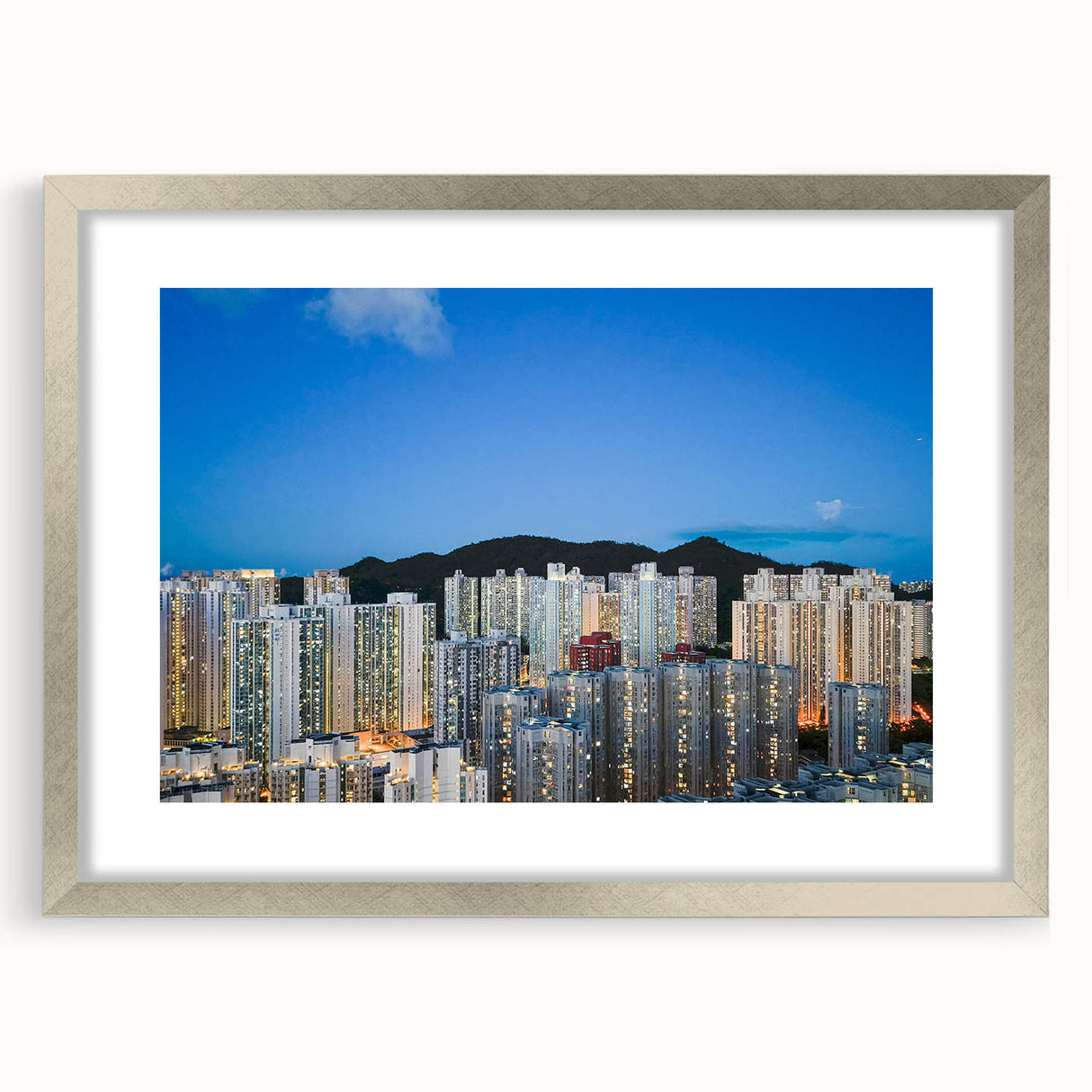 Textured art print of Hong Kong skyline in muted gray and silver tones, framed with a silver mat.