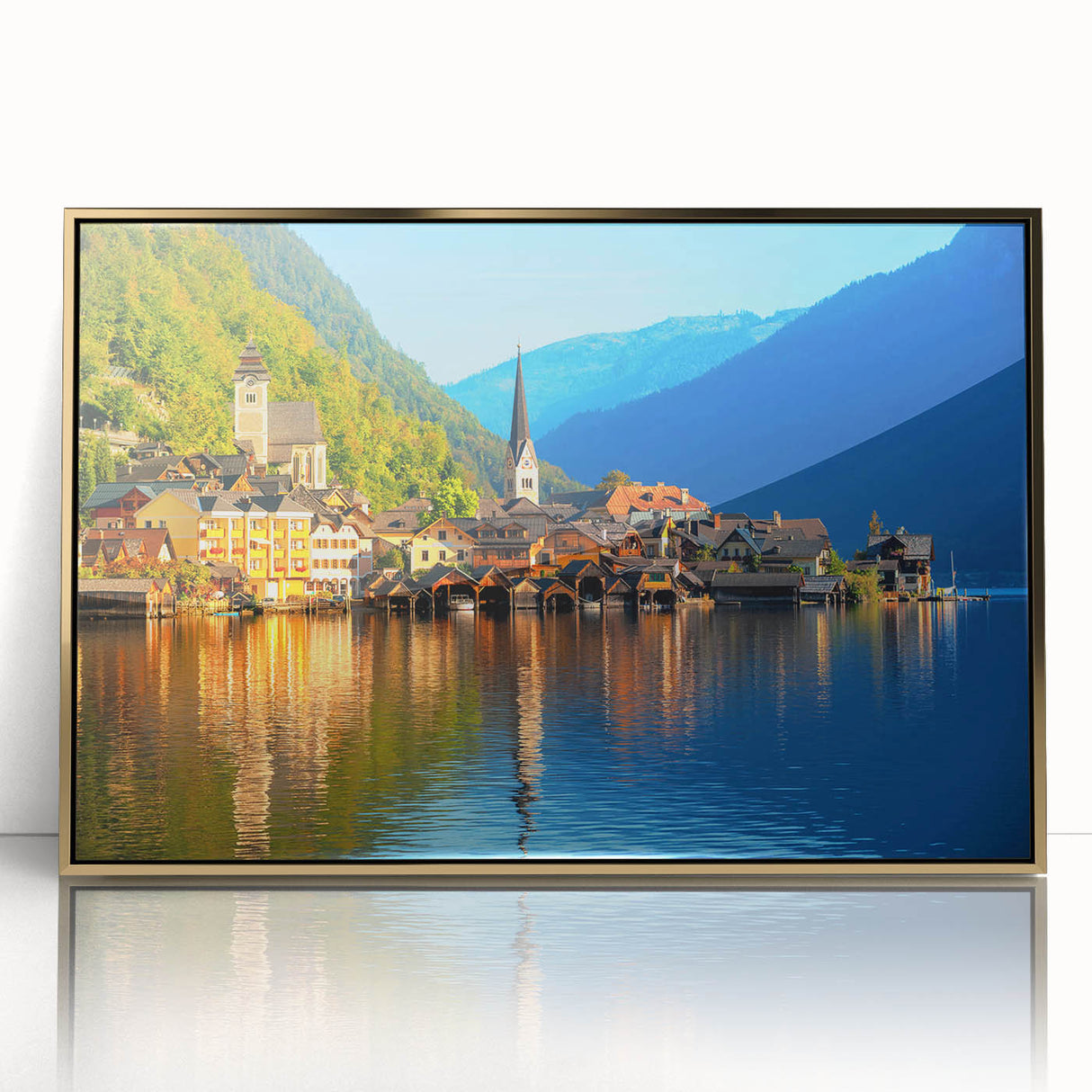 Art deco poster of a European Austrian landscape in muted gold and green tones, framed acrylic.