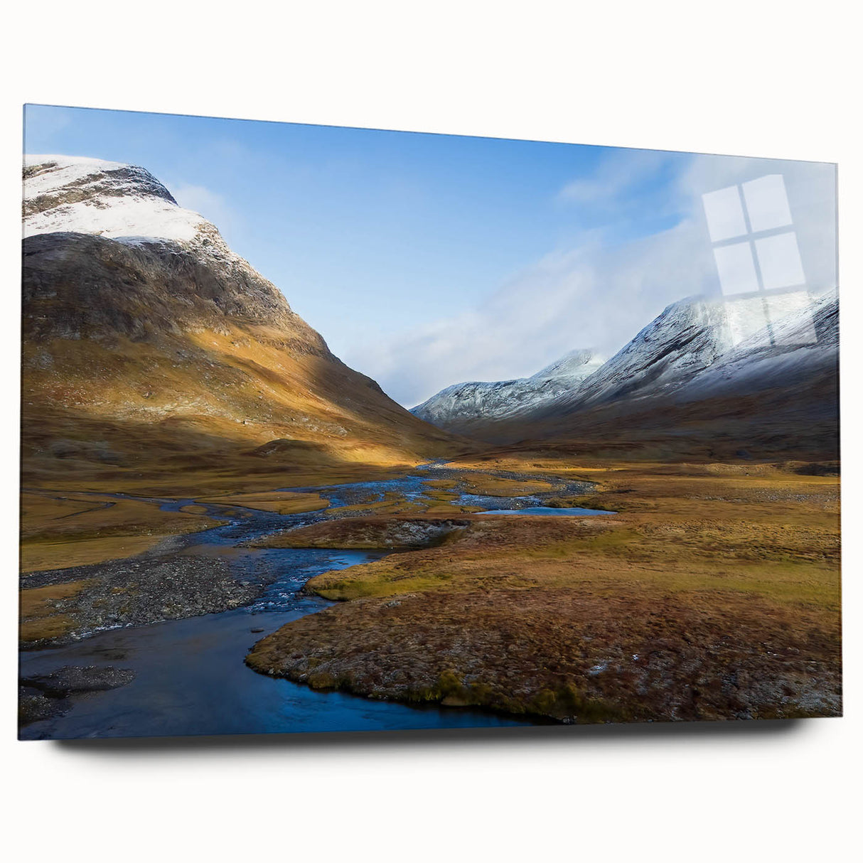 Large abstract wall art of a European scenery in muted blue and green tones on acrylic glass.