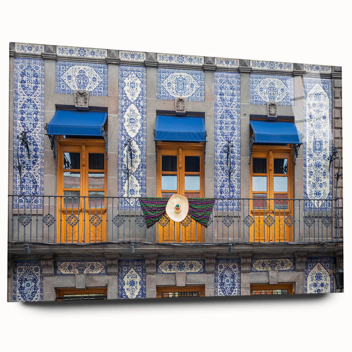 Large abstract wall art of Mexico City scenery on acrylic glass, featuring muted earth tones.