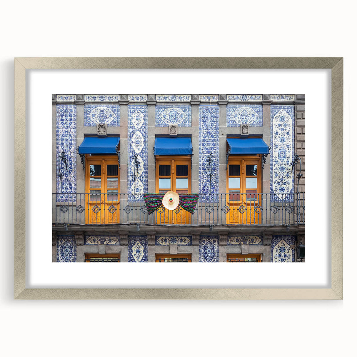 Textured abstract art print of Mexico City in muted earth tones on a framed canvas, suitable for bedroom decor.