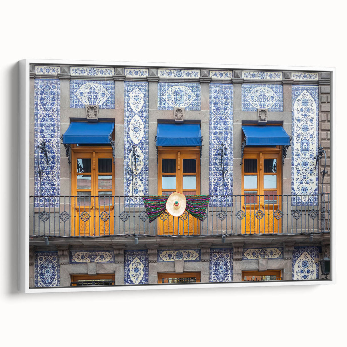 Vintage poster art of Mexico City scenery on framed canvas, featuring vibrant colors against a black background.