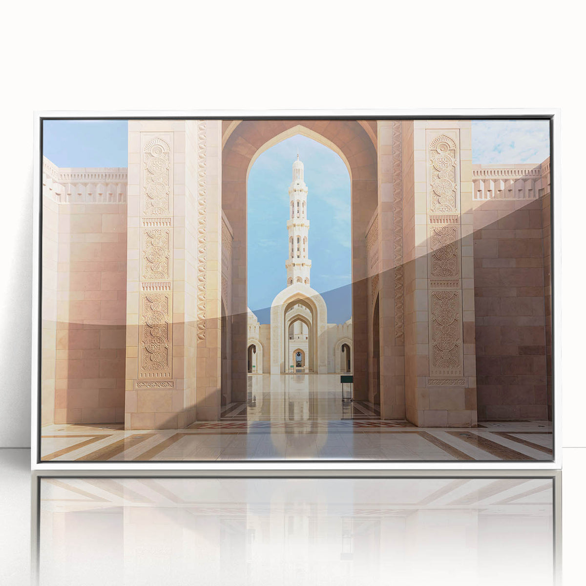 Acrylic print of an Omani landscape in muted earth tones, framed in white, suitable for modern art wall decor.