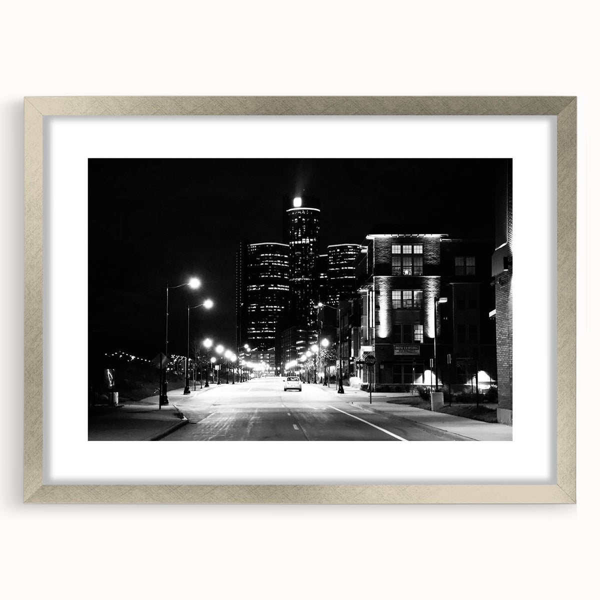 Textured abstract art print of Detroit skyline in muted gray and silver tones, framed with a mat, ideal for bedroom art.