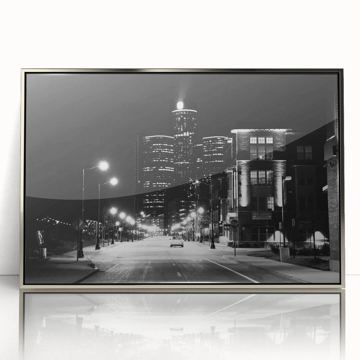 Mid-century modernist art of Detroit skyline in muted silver and blue hues on framed acrylic.