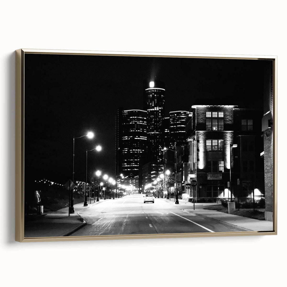 Framed canvas depicting vintage-style Detroit landscape in black and gold tones, suitable for bedroom wall art.