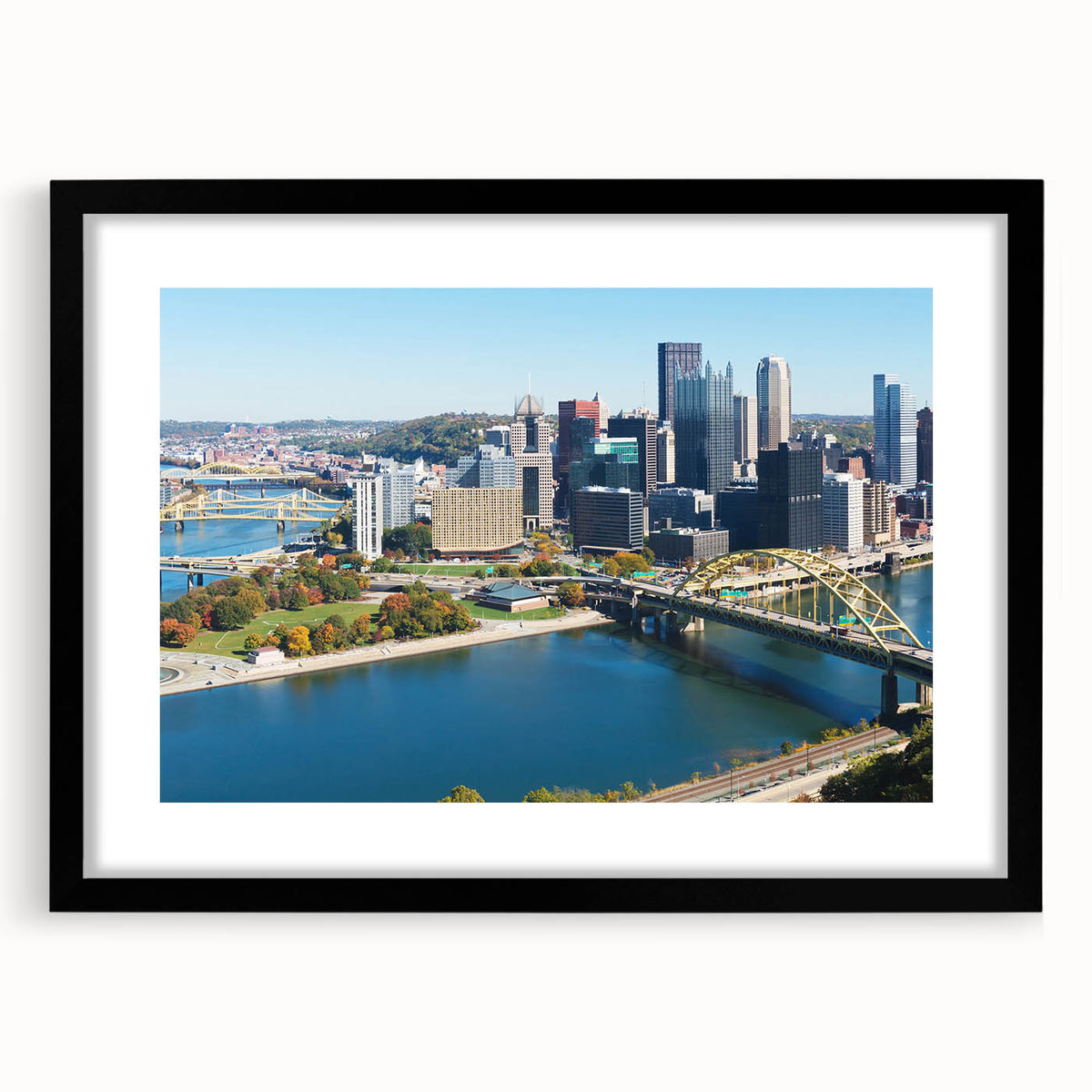 Extra large framed abstract print of Pittsburgh skyline in vibrant, colorful hues, ideal for living room decor.