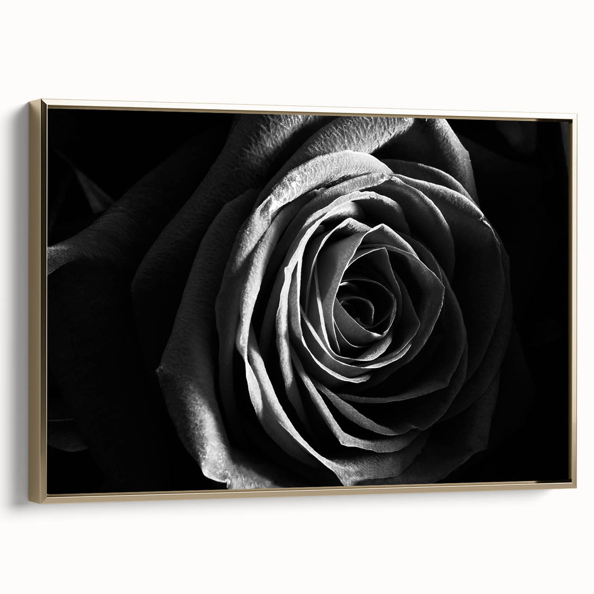 Framed canvas wall art showcasing an abstract floral design in vibrant colors with gold accents, displayed in a modern setting emphasizing elegance and creativity.