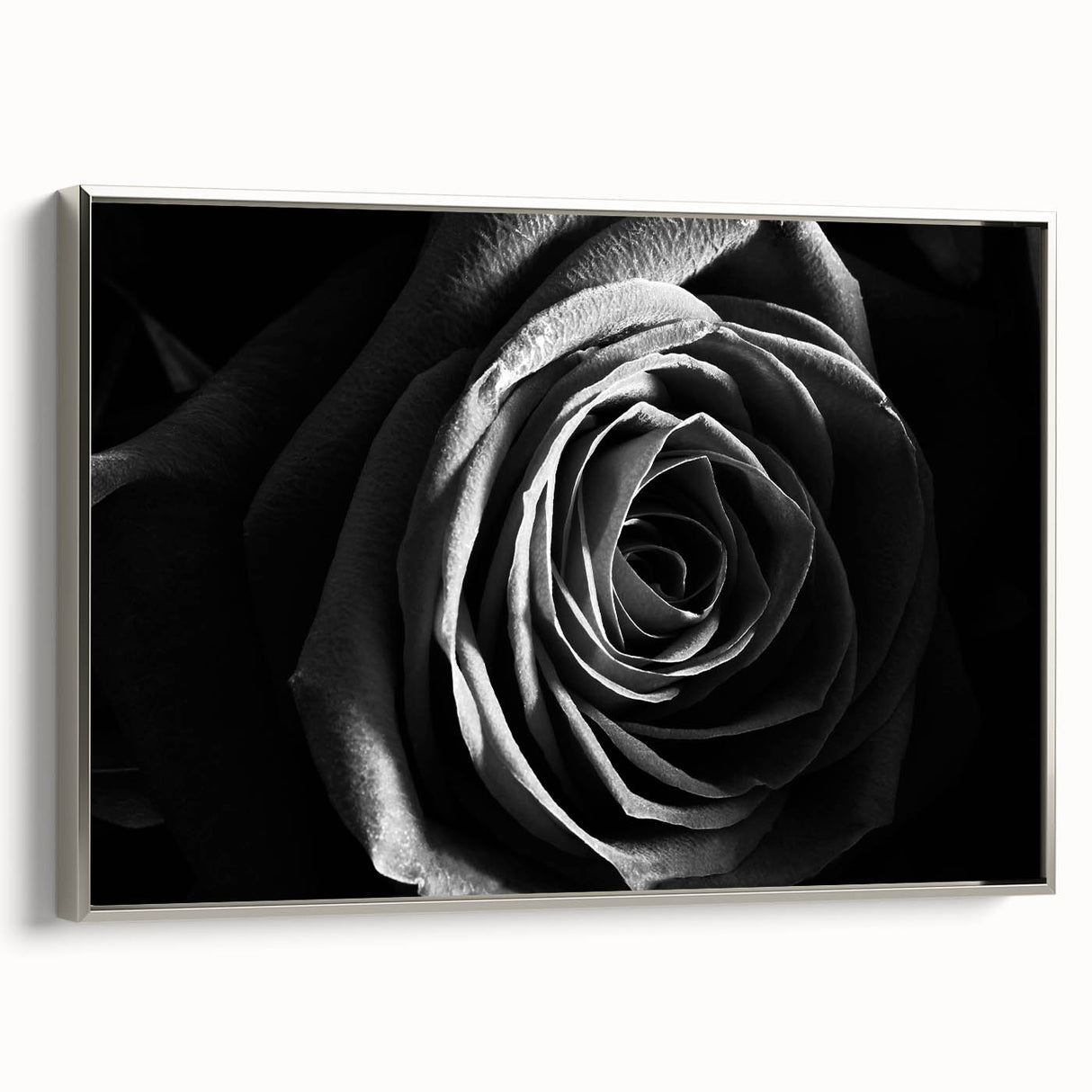 Framed wall art featuring an abstract floral design in vibrant colors, elegantly displayed with a sleek silver frame, perfect for modern home decor.