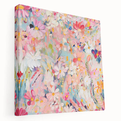 Stretched canvas wall art showcasing vibrant abstract florals in hues of pink, blue, and yellow, designed to enhance modern home decor with a chic, artistic flair.