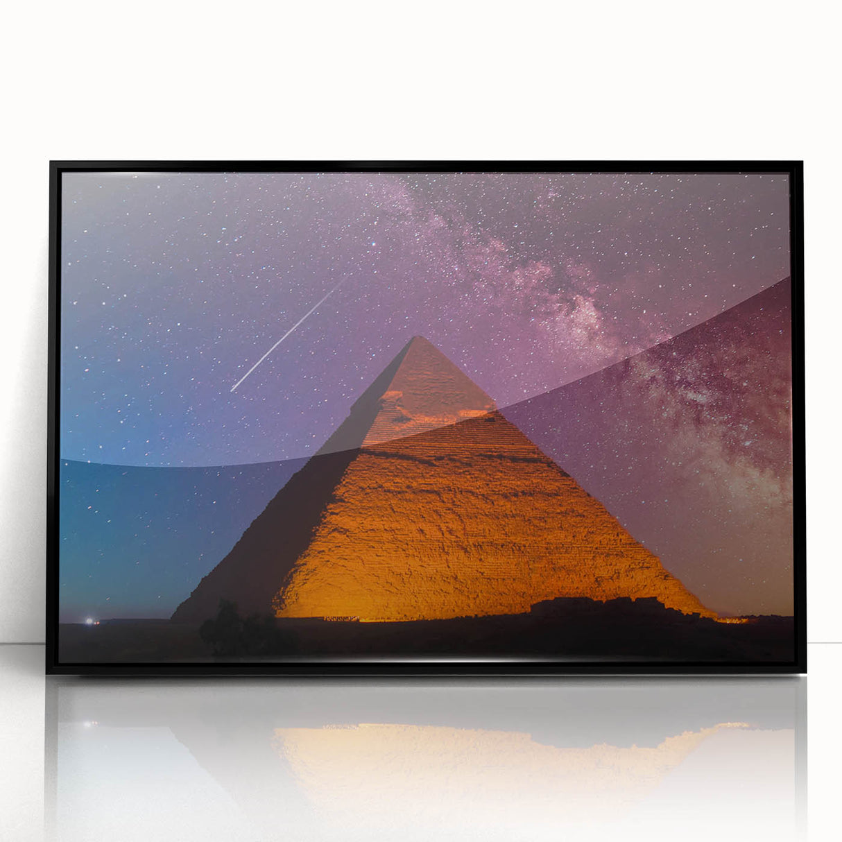 Large abstract wall art depicting a stylized Egyptian landscape in black and gold tones, framed in acrylic.