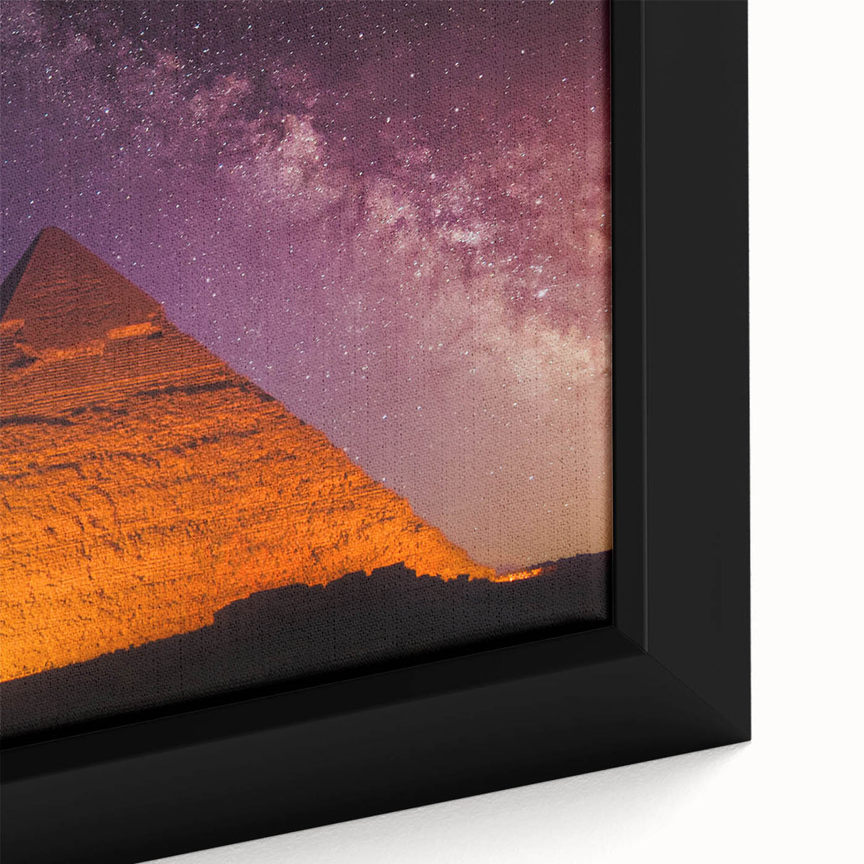 Framed canvas depicting a textured, colorful Egyptian landscape in black, ideal for living room decor.