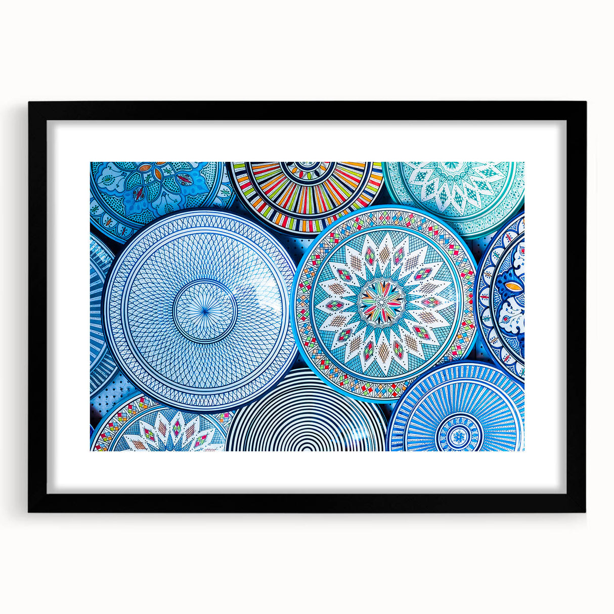 Extra large abstract art print depicting a colorful Moroccan landscape in a black frame, ideal for living room decor.