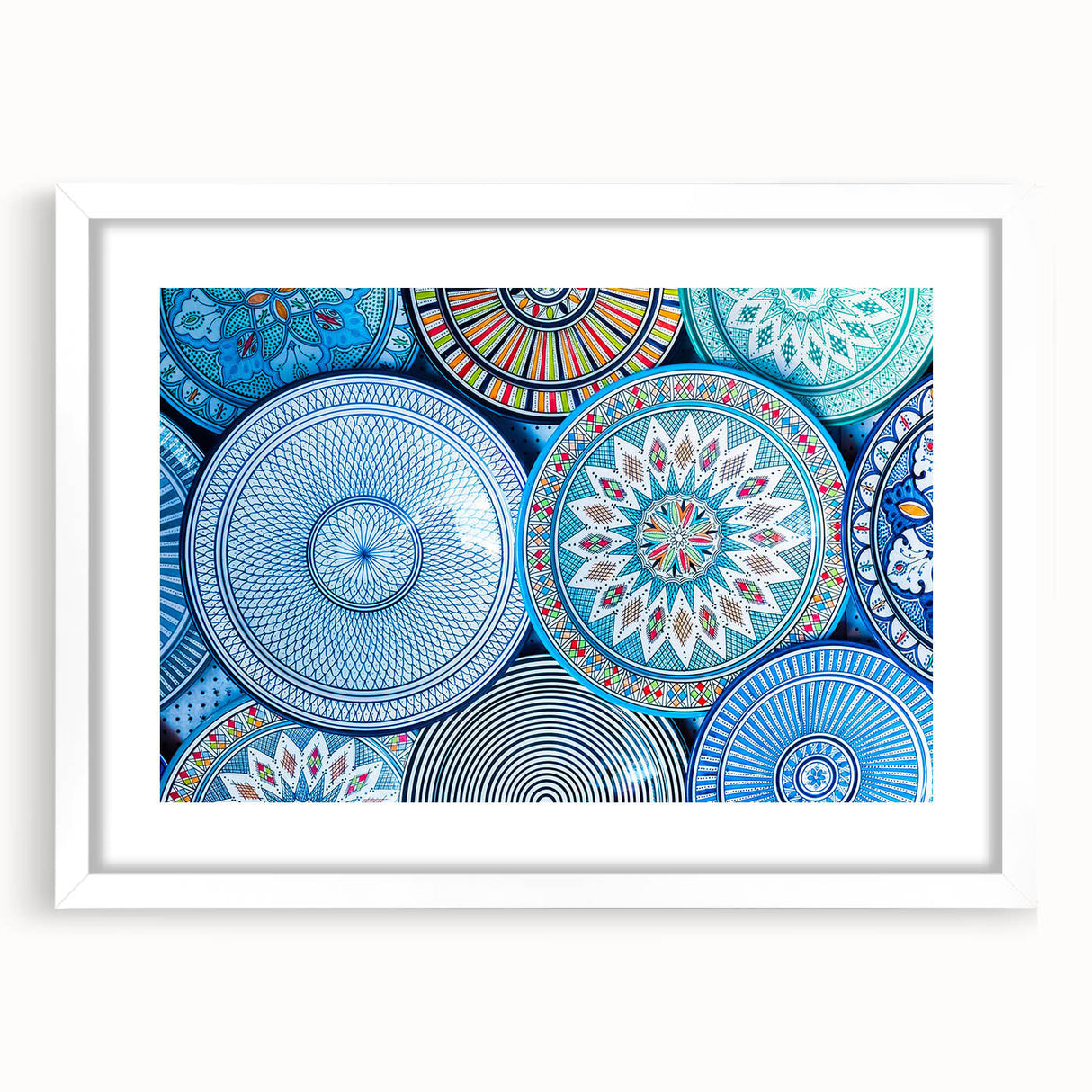 Extra large abstract art print depicting a textured Moroccan scenery in earthy tones, framed with a white mat.