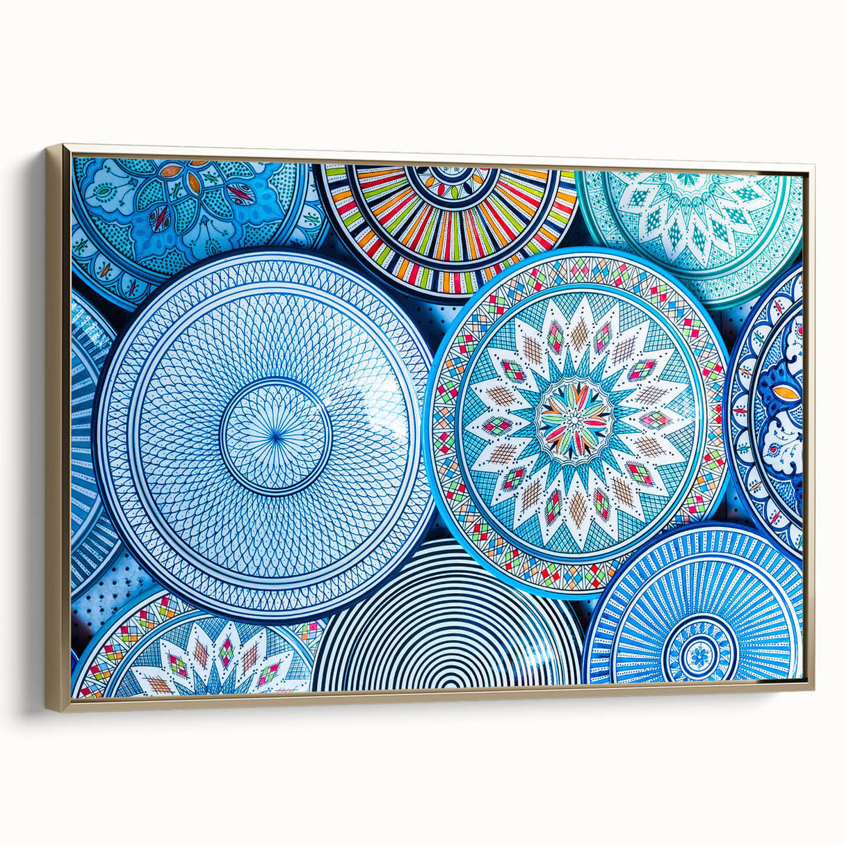 Framed canvas landscape art painting depicting a Moroccan scenery in vibrant gold and black tones.