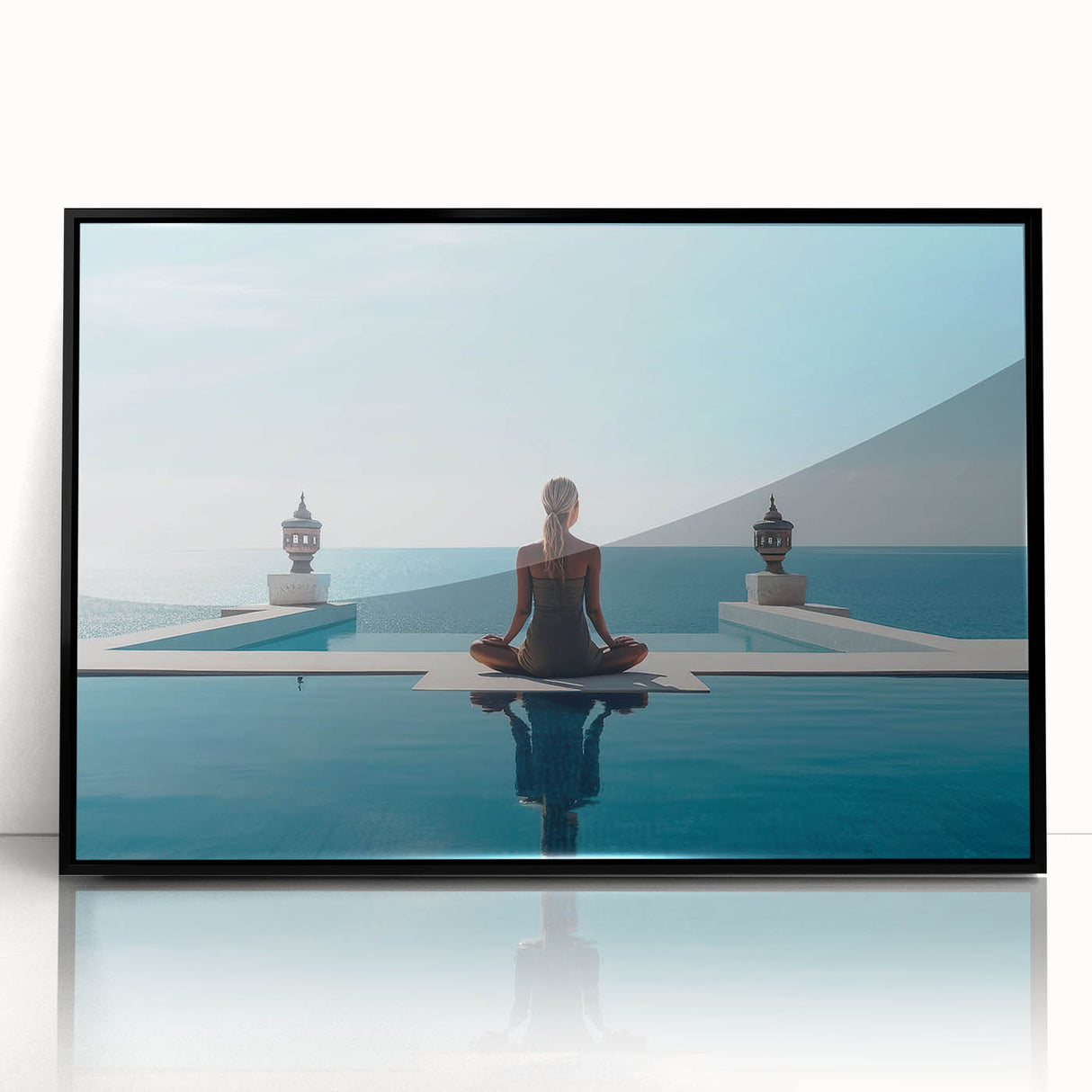 Large abstract wall art featuring a serene Maldives scenery in muted blue tones, framed in black acrylic.