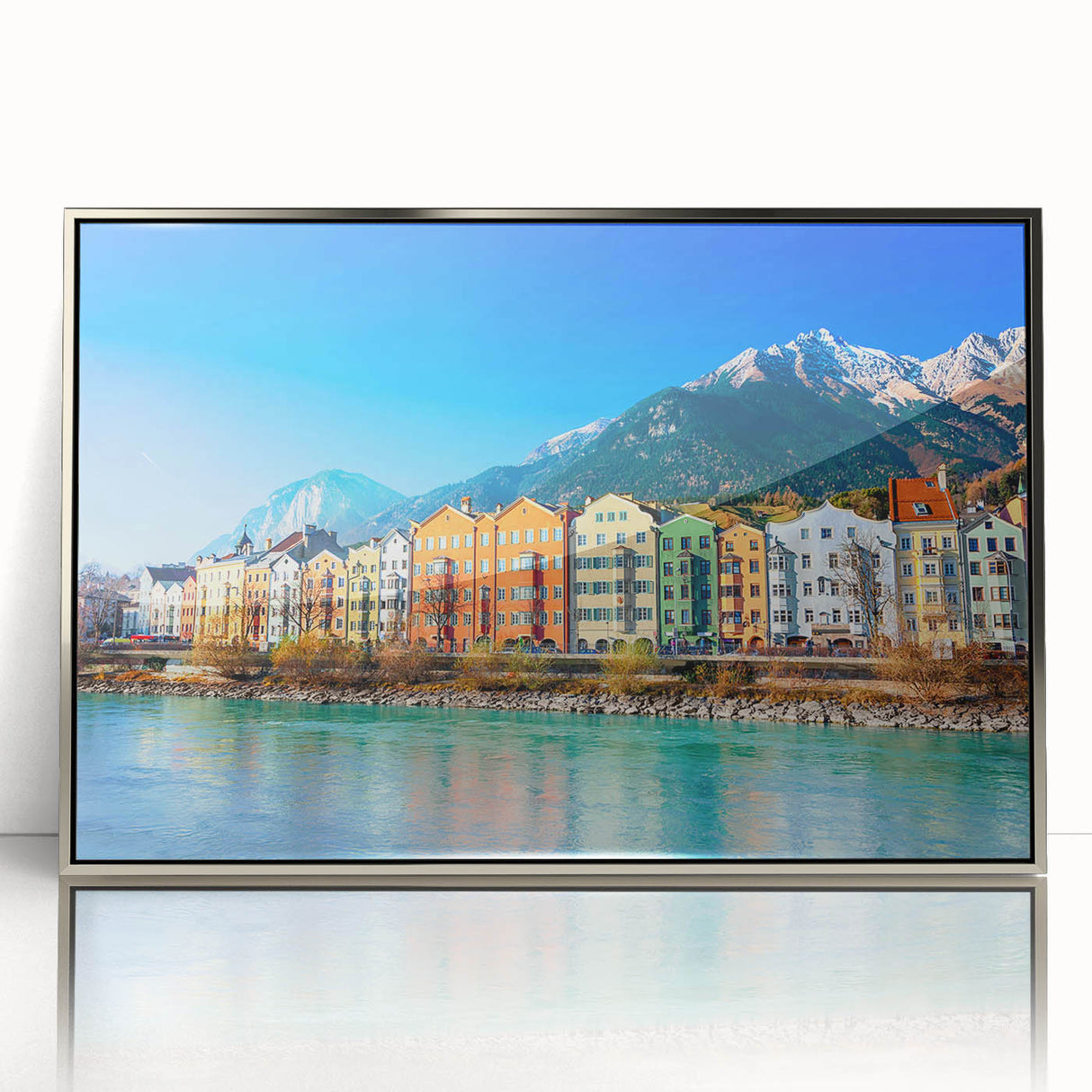 Large art print of a serene Austrian landscape in muted greens and blues, framed in silver acrylic.