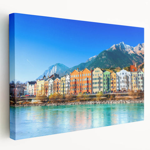 Side view of a stretched canvas depicting a scenic European landscape in muted earth tones, ideal for kitchen wall art.