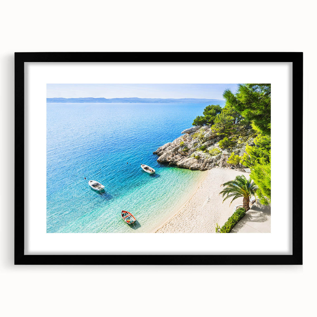 Colorful abstract art print of a European landscape in vibrant hues, framed with a black mat, ideal for living room decor.