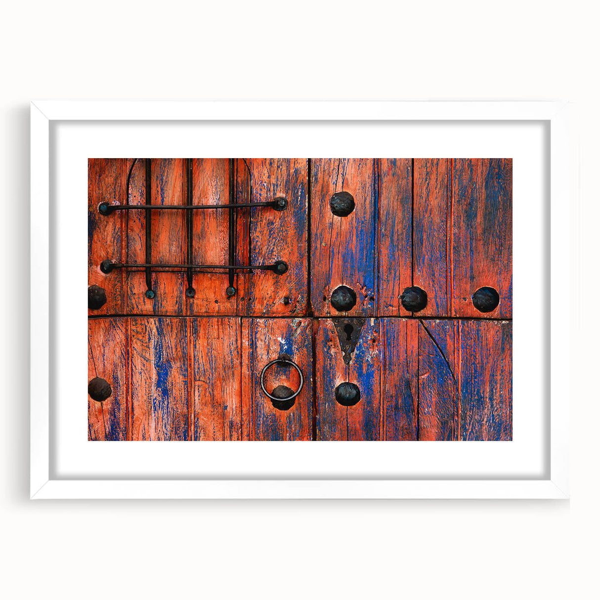 Abstract art print of Baja California scenery in muted earth tones on a framed white mat, ideal for dining room decor.