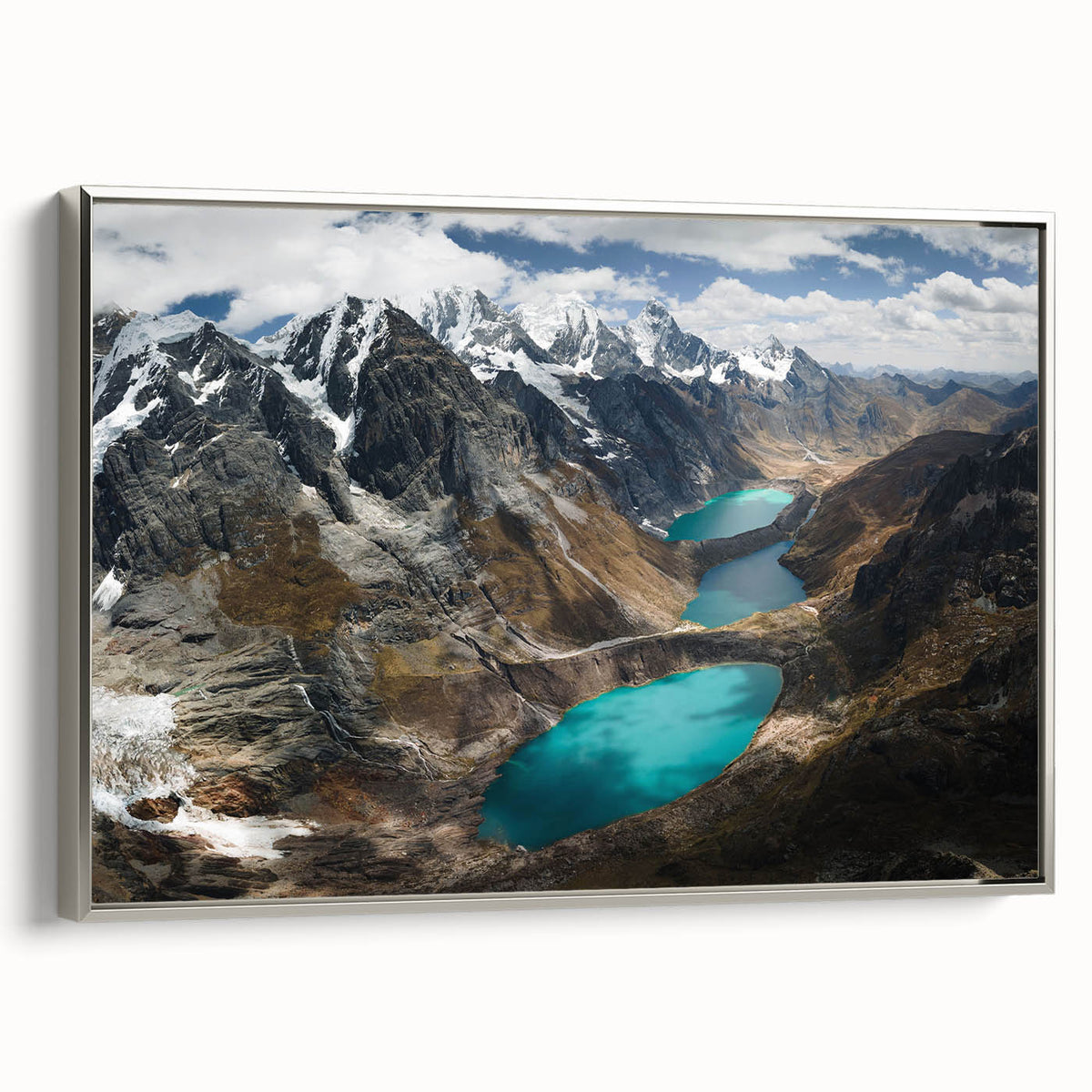 Framed canvas landscape art painting featuring a colorful vintage poster of a Peruvian scene.